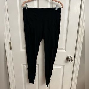 Black leggings with chris cross cut outs on back of calves